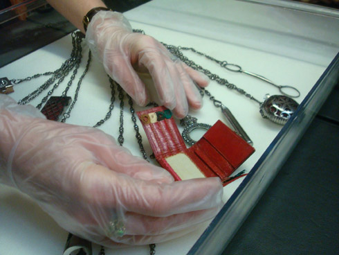 Figure 3: Metal handling session V&A museum: detail of Victorian Chatelaine showing students experiencing movement 2007